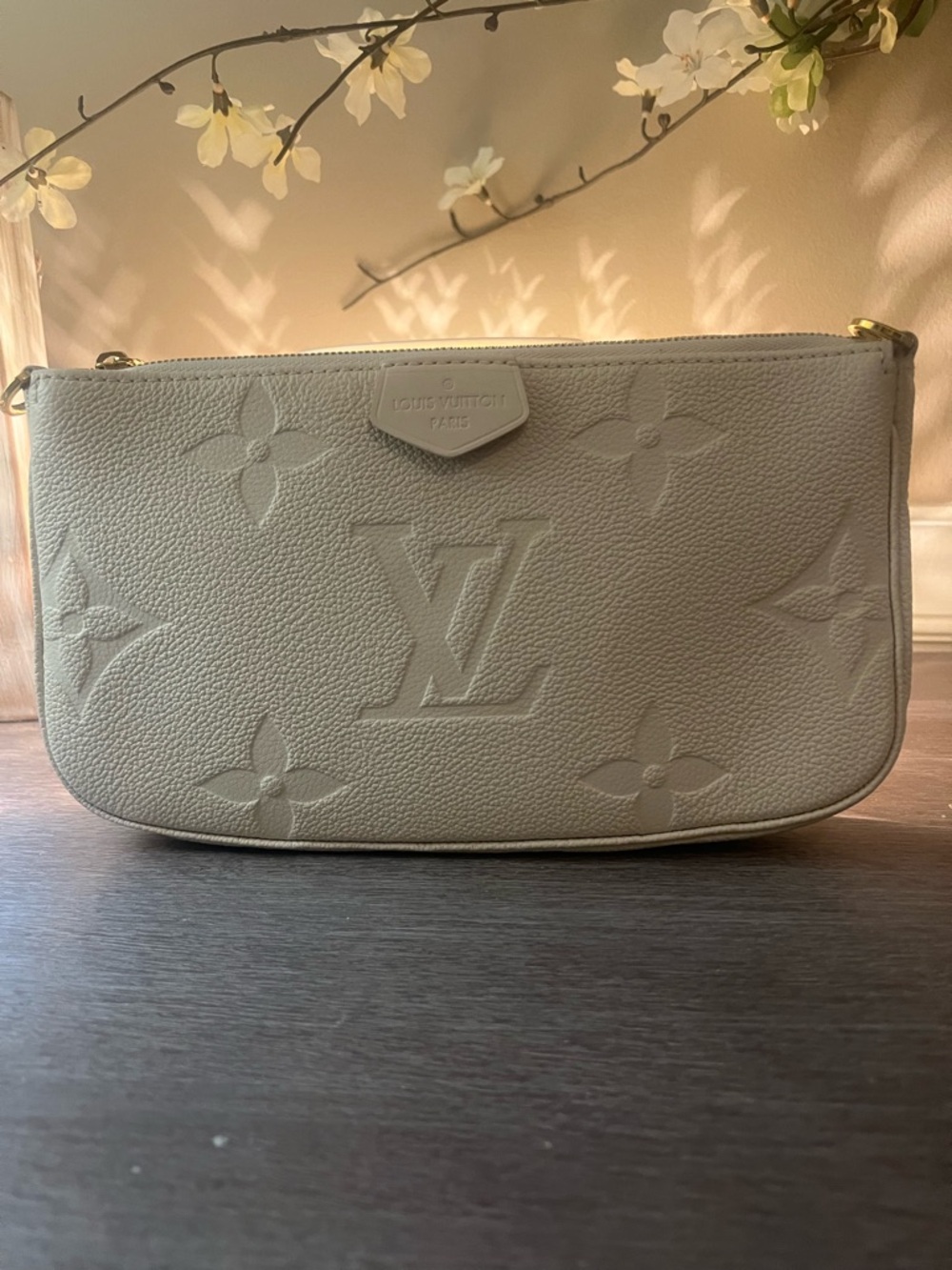 Louis Vuitton Embossed Monogram Crossbody Bag in Light Beige/Cream